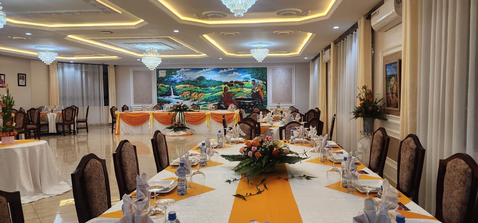 The dining hall, prepared for a festive meal.