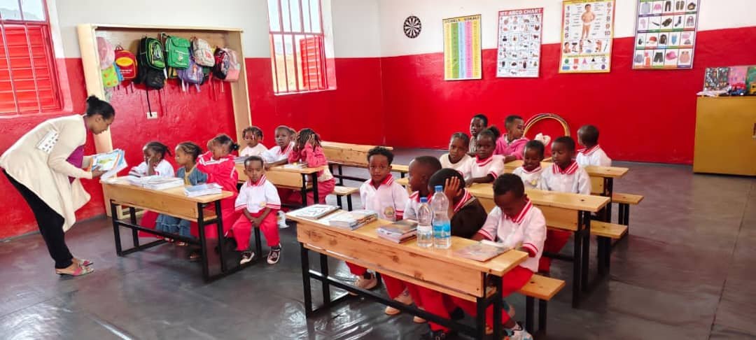 Upper Kindergarten class with their teacher at Spiritan Primary School Yabello