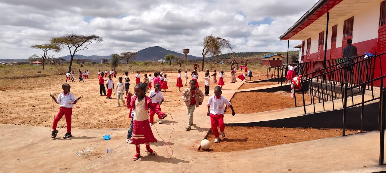 Pupils playing in front of the new Spiritan Primary School building in Yabello